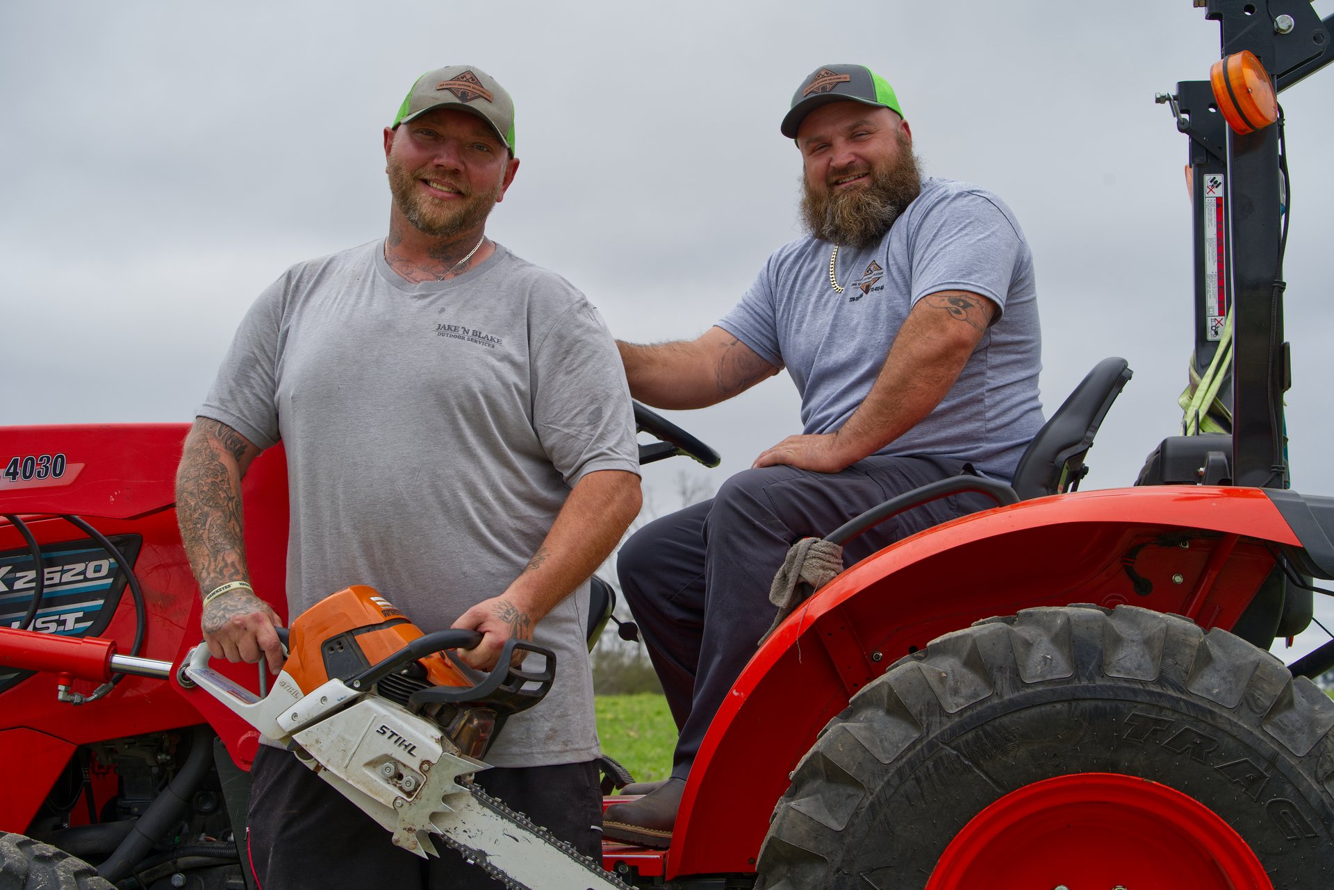 Jake and Blake with their Kioti tractor and equipment